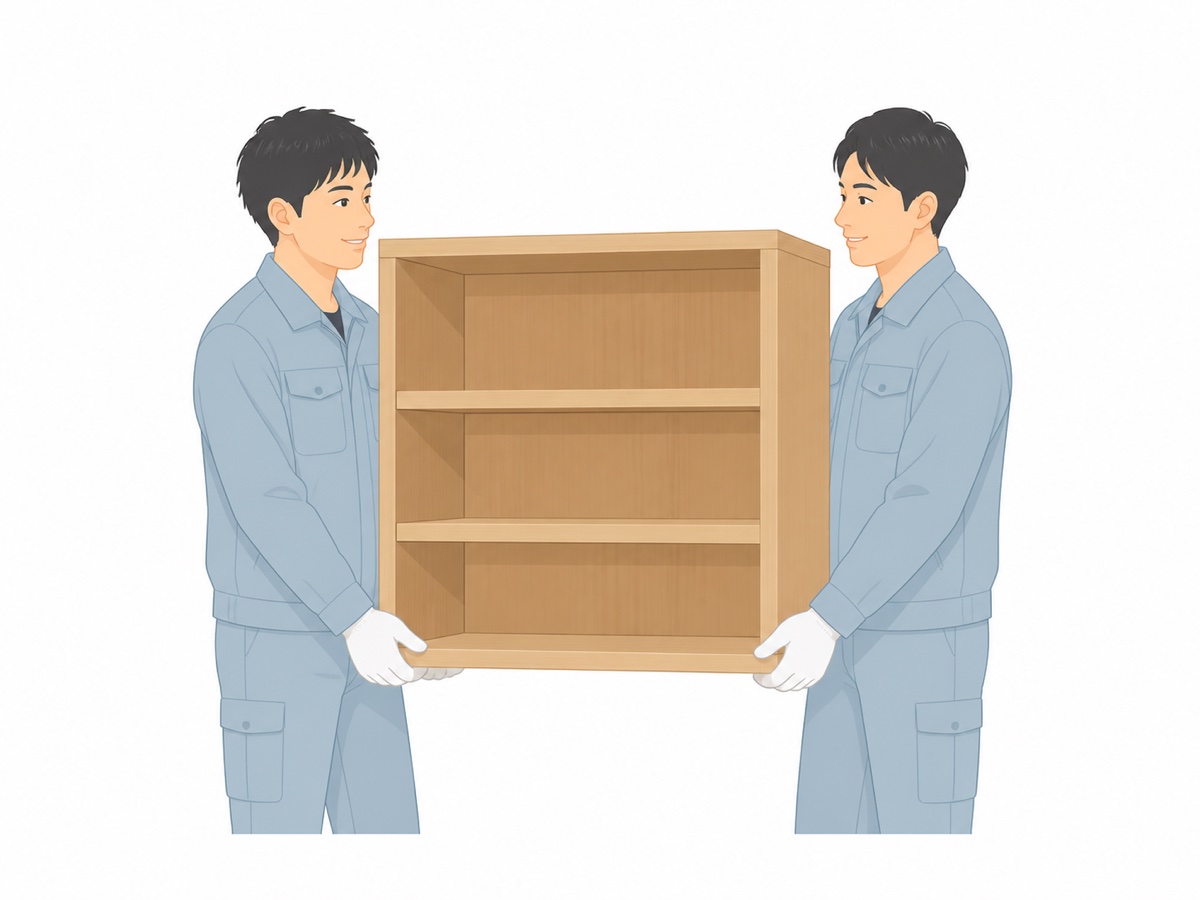 本棚をプロのスタッフが運び出す様子